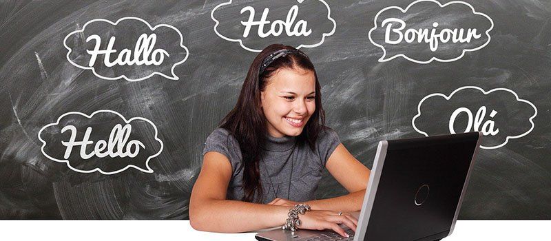 Girl learning new language on her laptop