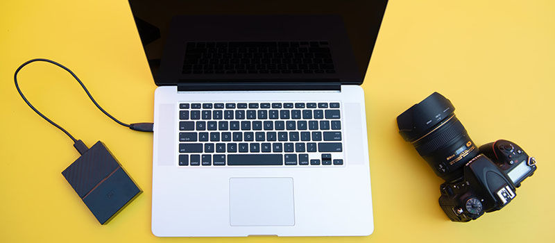 laptop with camera and external hard drive