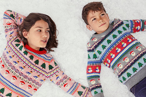 kids wearing colorful sweaters