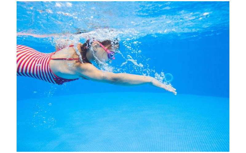 girl swimming in pool