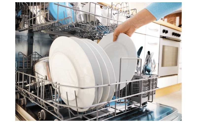 person unloading the dishwasher