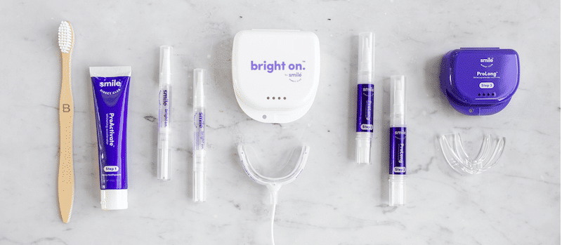 Overview shot of the bright on whitening kit and accessories